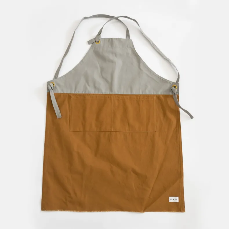 G.K.P Slip-On Style Apron with fringe finish : Organic Cotton