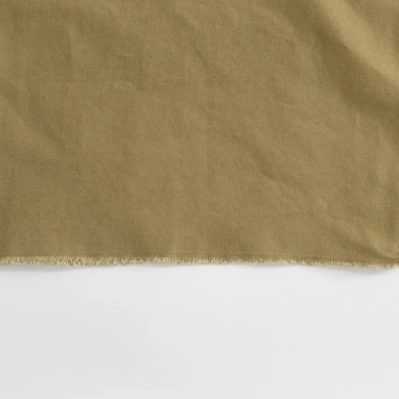 G.K.P Slip-On Style Apron with fringe finish : Organic Cotton